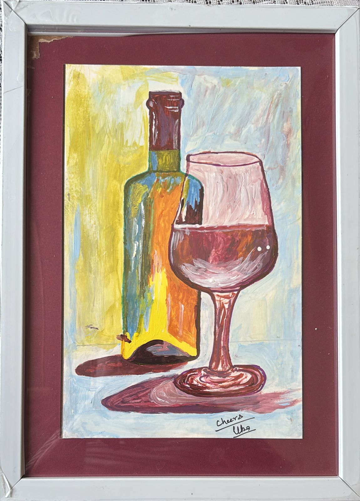 Bottle of wine with a half filled Glass.  Good for all occasions but in a limit